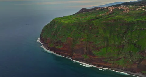 Aerial view by drone steep cliffs over the Atlantic ocean, where land meets 스톡 동영상 270610009