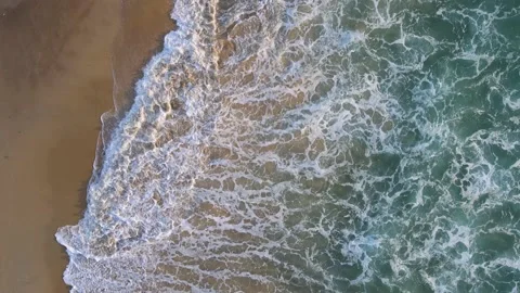 Aerial view of drone. Sunsets over sea. Beautiful sea waves. Beach sand and amaz Stock-Footage 143008897