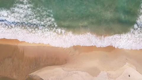 Aerial view of drone. Sunsets over sea. Beautiful sea waves. Beach sand and amaz Stock-Footage 143010599