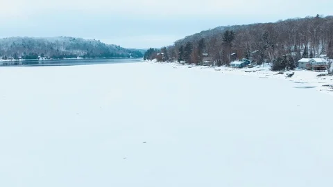 Aerial view from drone taking off at  Eagle Lake, Ontario, Canada Stock Footage 99989963