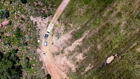 Aerial View of Drone Team Preparing for Agricultural Spraying Mission 스톡 동영상 333978585
