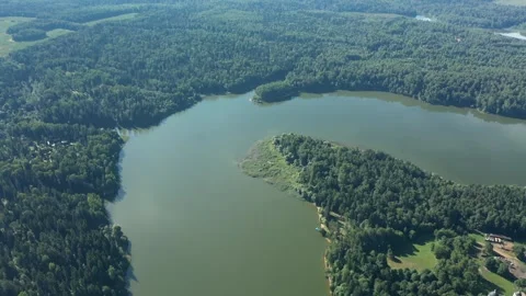 Aerial view drone tilting from river to horizon Stock Footage 320121891