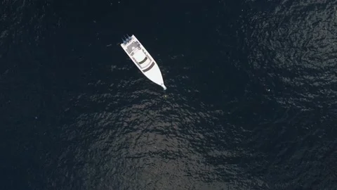 Aerial view drone top down luxury yacht on blue clear ocean water Stock Footage 145748852