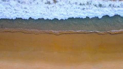 Aerial view of drone top down view beach and sea crystal water wave Stock Footage 172388746