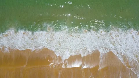 Aerial view of drone top view beach and crystal seawater on sandy beach  Video stock 172386468