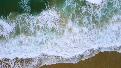 Aerial view of drone top view beach and crystal seawater on sandy beach  Stock Footage 172386574