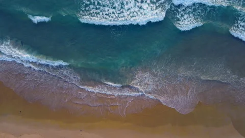 Aerial view of drone. Top view of seawater wave in nature on sandy beach. In sun 스톡 동영상 172954819
