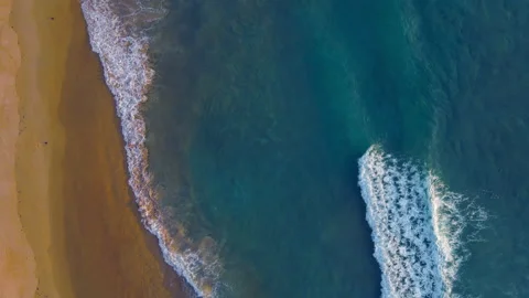 Aerial view of drone. Top view of seawater wave in nature on sandy beach. In sun Stock Footage 172959712