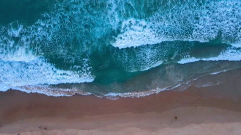 Aerial view of drone. Top view of seawater wave in nature on sandy beach. In sun Stock Footage 173026121