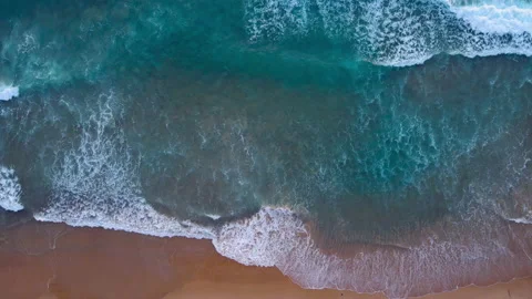 Aerial view of drone. Top view of seawater wave in nature on sandy beach. In sun Stock Footage 173068938