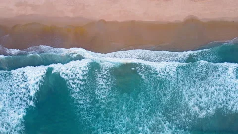Aerial view of drone. Top view of seawater wave in nature on sandy beach. In sun Stock Footage 173070011