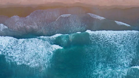 Aerial view of drone. Top view of seawater wave in nature on sandy beach. In sun Stock Footage 173070367