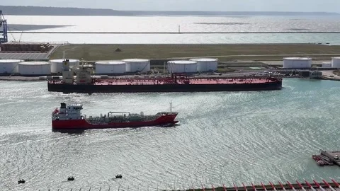 Aerial view by drone of two ships in Le Havre seaport Vidéo 330669672
