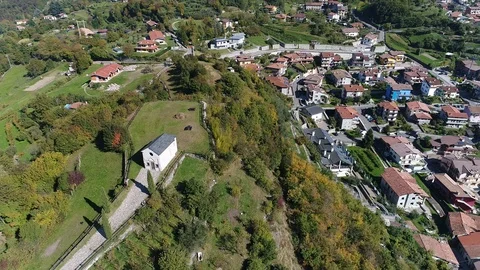 Aerial view with drone in Val Camonica - Italian Churches Stock Footage 99341426