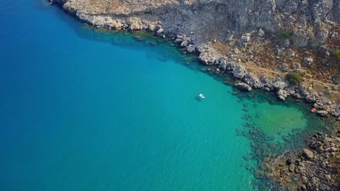 Aerial View: Drone video of iconic beach of Agathi and castle of Feraklos, Rodos Stock Footage 80581831
