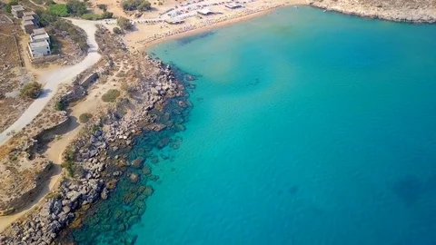 Aerial View: Drone video of iconic beach of Agathi and castle of Feraklos, Rodos Stock Footage 80582395