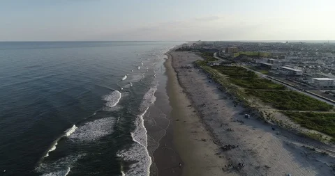Aerial view drone video of New Jersey beach in afternoon sunset Wildwood Stock Footage 116356174