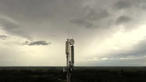 Aerial view drone view of a mobile telecommunication cell tower on a countryside Stock Footage 131911080