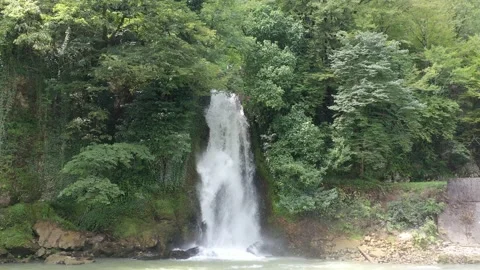 Aerial view from a drone to a waterfall in the forest Stock Footage 151189371
