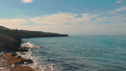Aerial view from the drone of the waves breaking on a beach in Bisceglie, nea 動画素材 164774685