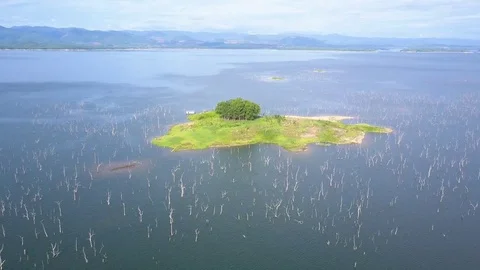 Aerial View from a drone while flying to the small island Stock Footage 78261326