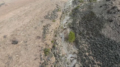 Aerial view of a dry river bed in a valley in south africa Stock-Footage 117386292