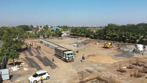 Aerial View of Dump Truck Unloading Sand at Active Construction Site. Vidéo 339097732