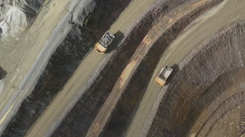 Aerial view of dump trucks in Boral Montrose quarry, Australia. Stock Footage 345070770