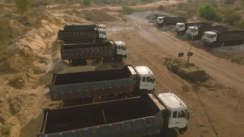 Aerial View Dump Trucks Parked at Coal Mine Worker Stock Footage 338161354