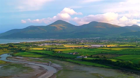 Aerial view of Dundrum bay during low tide Newcastle and Mourne mountains N.. Stock Footage 337392931