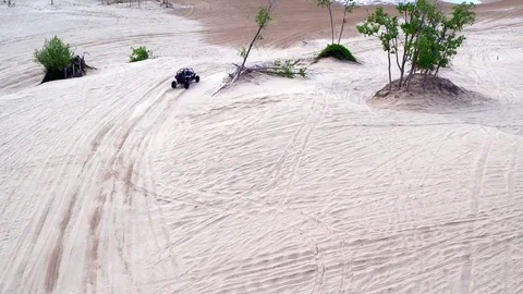 Aerial View Of Dune Buggy Chase Video stock 77104058