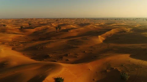Aerial view of dunes creating shadows at a desert landscape, U.A.E. Stock Footage 103047786