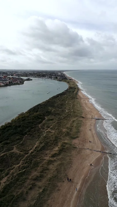 Aerial view dunes separate the river from the sea. Video stock 266321043