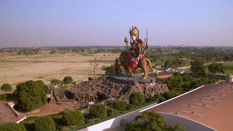 Aerial view on Durga temple statue in Vrindavan, India  4k drone view Video stock 109375777