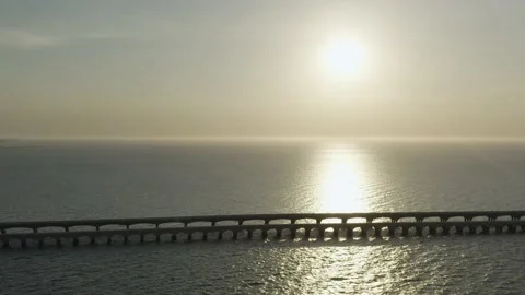 Aerial view during sunset bridge over the ocean in Puerto Progreso, Stock Footage 189628031