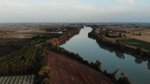 Aerial view during sunset of a large river. Stock Footage 139379425