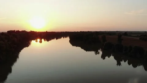 Aerial view during sunset of a large river. Stock Footage 139379749