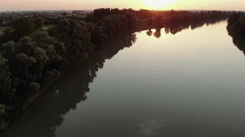 Aerial view during sunset of a large river. 스톡 동영상 139379870