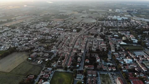 Aerial view during sunset of small town. Stock Footage 139379331