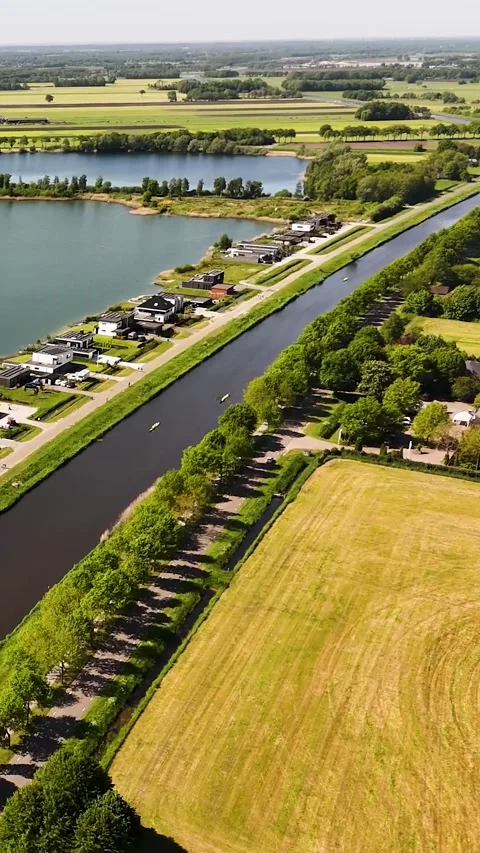 Aerial view of a dutch canal and residential area Stock Footage 327109341