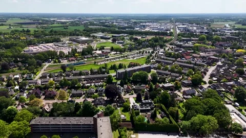 Aerial view of a dutch town with train station and suburbs 스톡 동영상 336594848