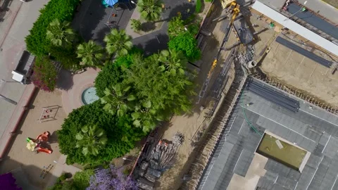 Aerial View: A dynamic site captures workers and engineers managing foundation Stock Footage 296096030