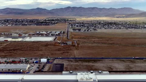 Aerial View of Eagle Mountain Utah Data Center Complex in Vast Desert Landscape Stock Footage 342093317