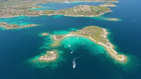 Aerial view of Eagle Rock at Diaporos Island in Halkidiki, Greece, showing Stock Footage 346687455