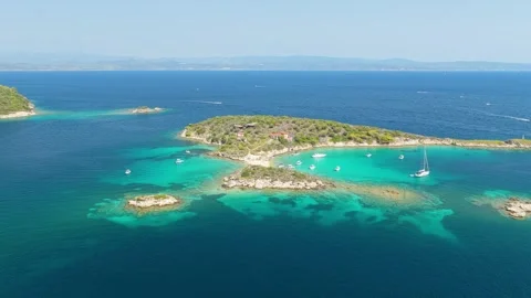 Aerial view of Eagle Rock at Diaporos Island, located in the Halkidiki region of Stock Footage 346715128