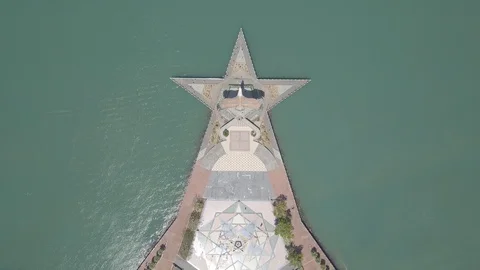 Aerial view of Eagle statue Dataran Helang on star square, Kuah town, Langkawi Stock Footage 121361326