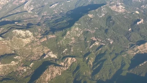 Aerial view of earth with forests and mountains Stock Footage 337221050