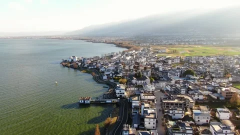 Aerial view of east lakeside connected residential houses wide lake scenery in Video stock 337923451