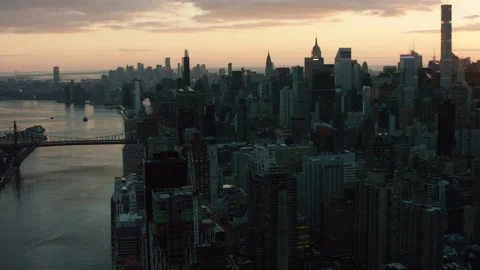 Aerial view of the East River and buildings and skyscrapers in Manhattan, New Yo Stock Footage 199459181