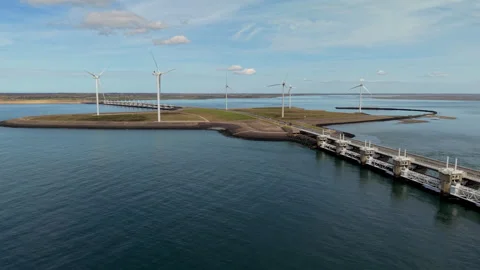 Aerial view of the Eastern Scheldt storm surge barrier and wind turbines. Stock Footage 337590056